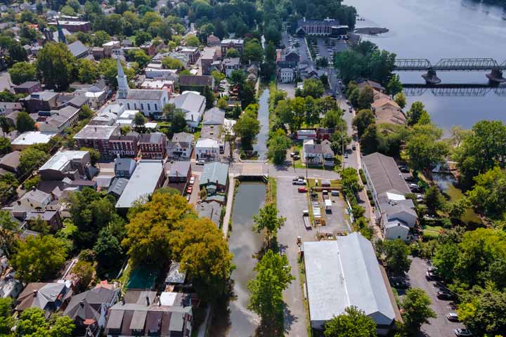 Arial view of commercial buildings and their roofs